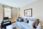 Open living room in a one bedroom gold-rated River Run Village Condo